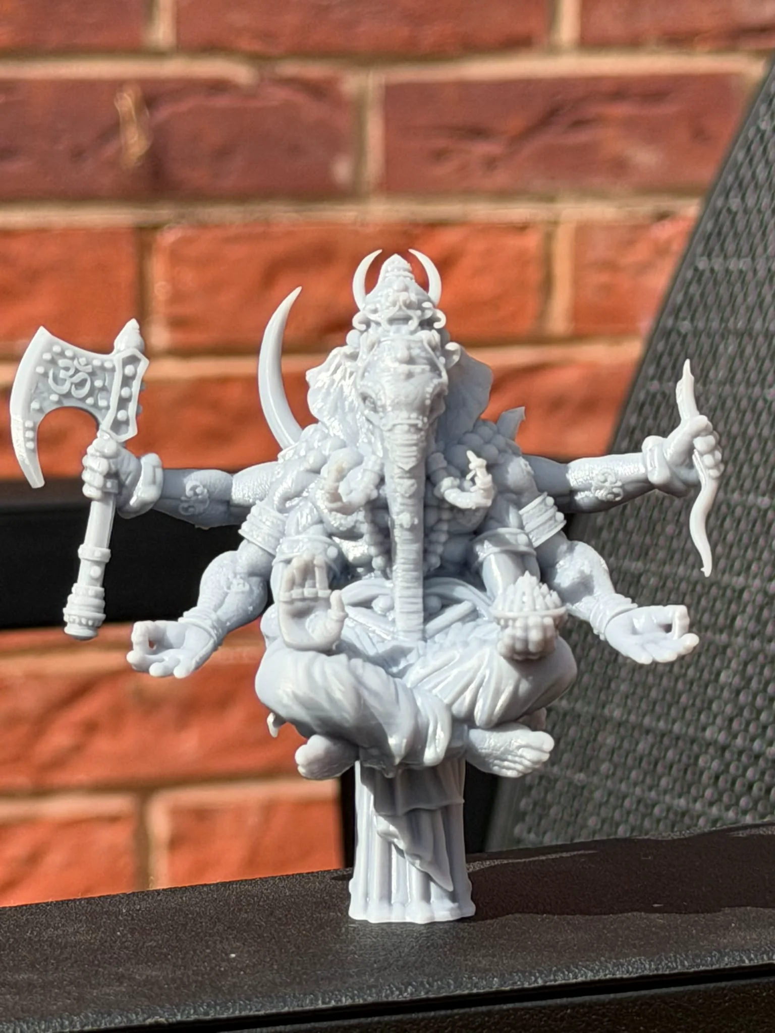Front workshop photograph of the physical Ganesha resin print